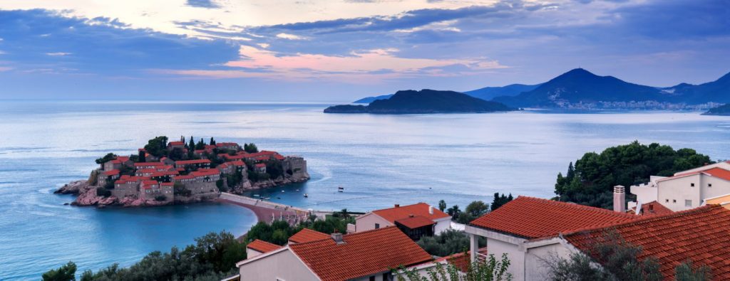 Sveti Stefan island at sunrise. Adriatic sea, Montenegro - Adventures Croatia