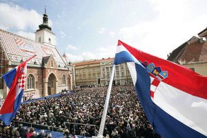 croatian flag and crowd in town