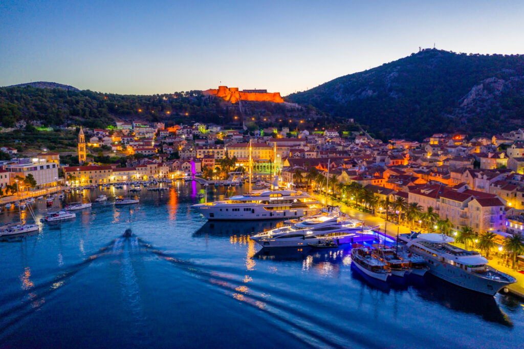 the coastal town of Hvar lit up at night