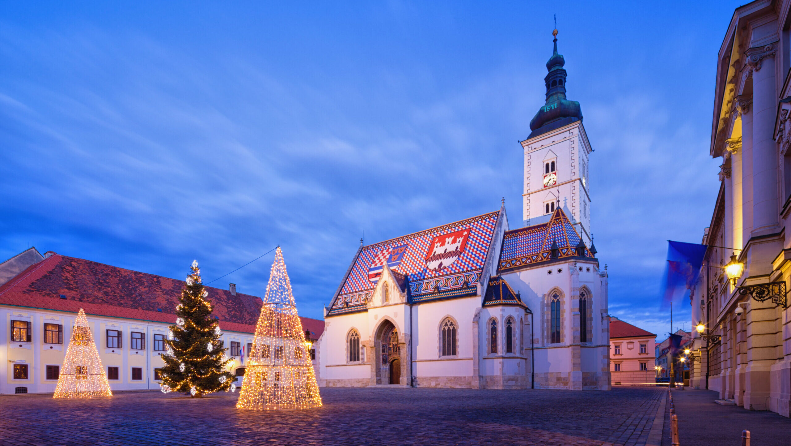 What to do in Croatia in Winter? Festive scene outside of St Marks Chruch in Zagreb