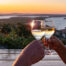 couple clinking glasses of Croatian wine in the wine regions of Croatia