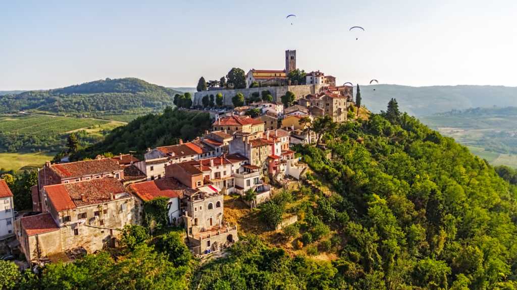 Motonvun, a hidden gem in Croatia, where you can see the surrounding vineyards and lush greenery