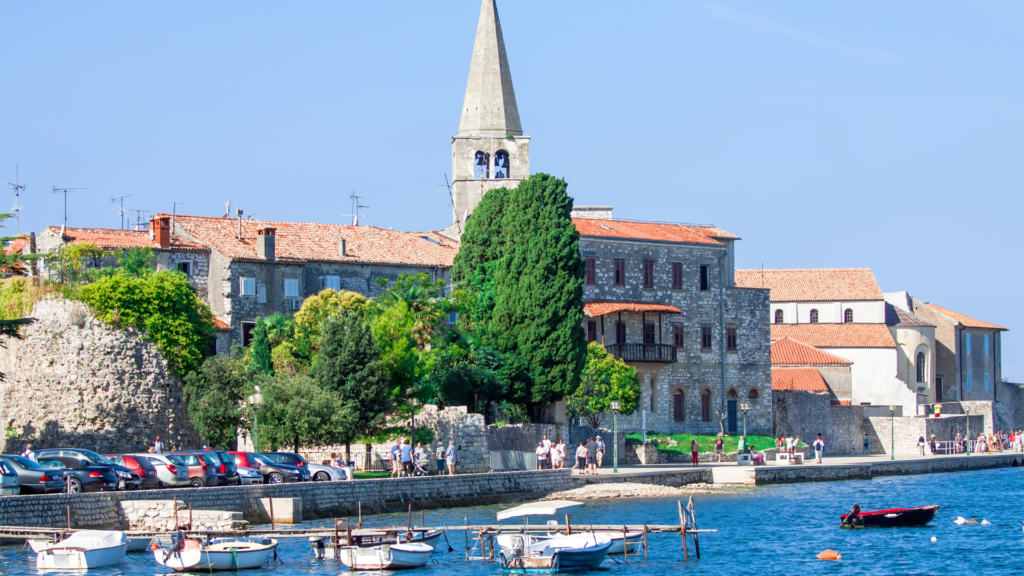 Istrian Coast, with ancient buildings and boats floating on the water seen on a family trip to Croatia