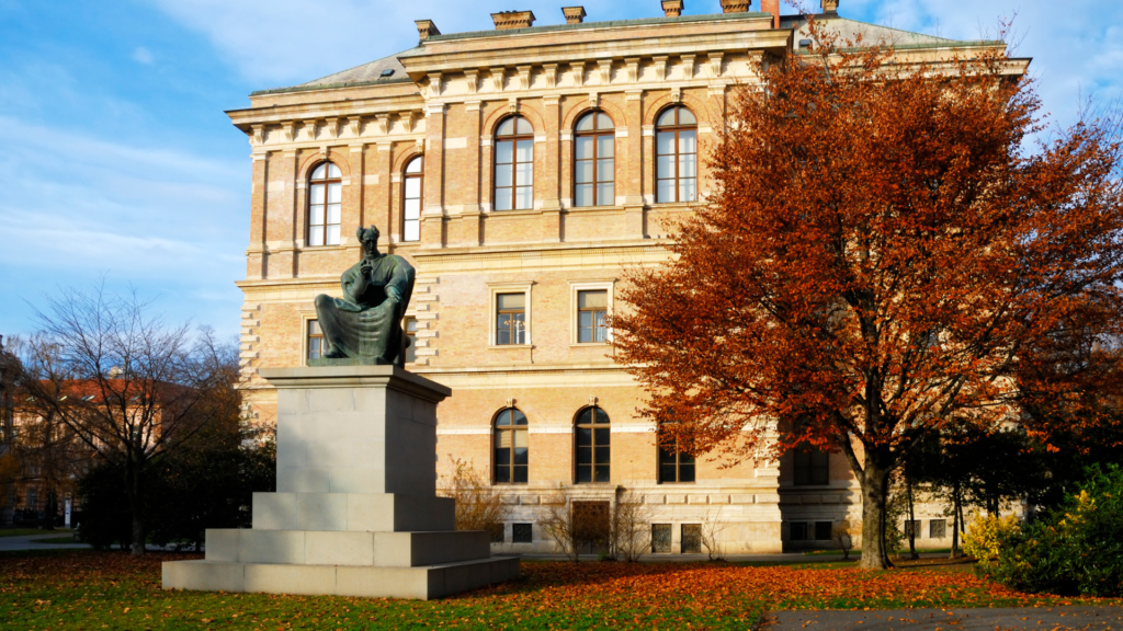 Zagreb, Croatia in October - orange leaves surrounding a monument